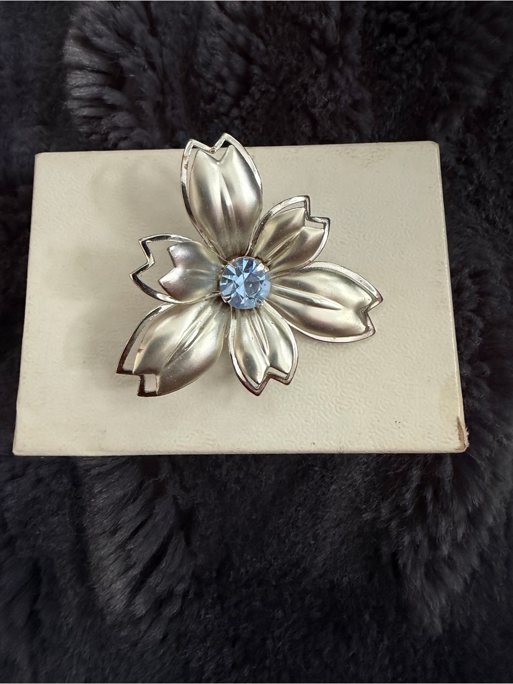 Vintage Silver Floral Brooch with Light Blue Gem Accent